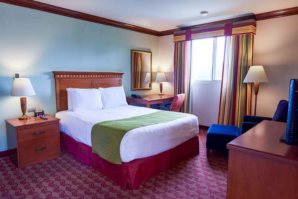 Suites Las Palmas, Hotel & Apartments. San Salvador Quarto foto